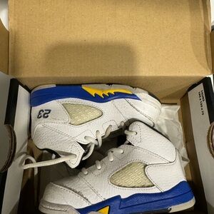 Nike Jordan Kids White and Blue Sneakers with Yellow Accents